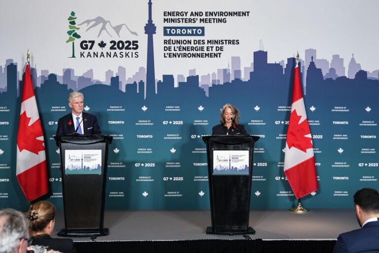 G7 Energy and Environment Ministers' Meeting in Toronto, ministers speaking at bilingual podiums with Canadian flags